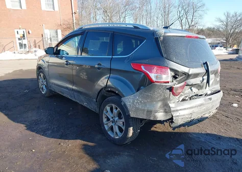 2016 Ford Escape Titanium z USA, uszkodzony, nr VIN 1FMCU9J97GUB85018
